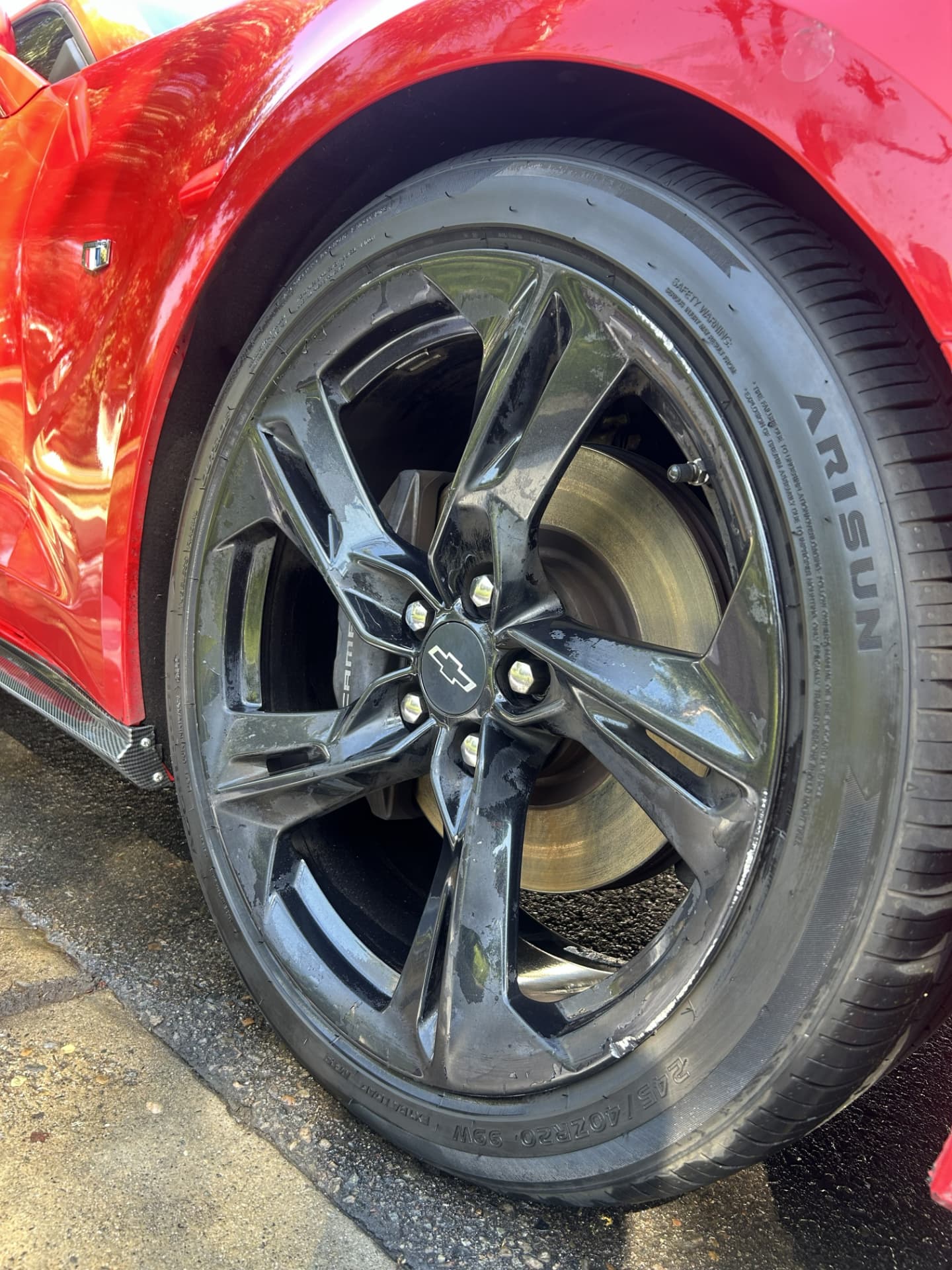 Red Chevrolet Camaro SS — cleaned wheel and tire